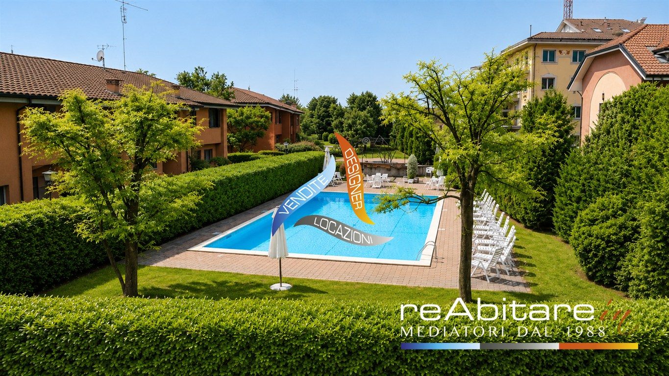 VILLETTA A SCHIERA ARREDATA CON GIARDINO PRIVATO E BOX DOPPIO